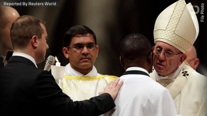 Pope Baptizes Italy 'Migrant Hero' At Easter Eve Service