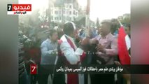 مواطن يرتدى علم مصر باحتفالات فوز السيسى بميدان روكسى