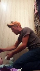 Dad With Weak Stomach Changing a Baby