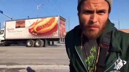 Animal Rights Protesters Attempt to Stop a Truck and Almost Get Run Over