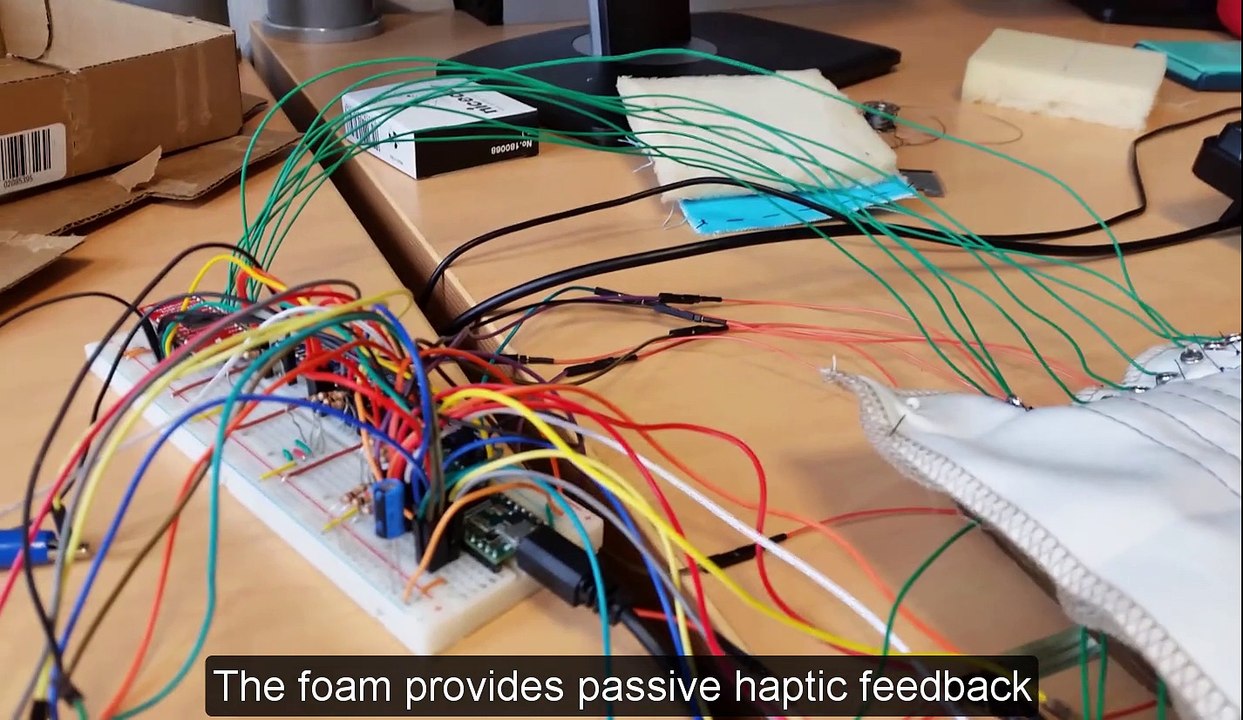 A tangible surface for digital sculpting in virtual environments