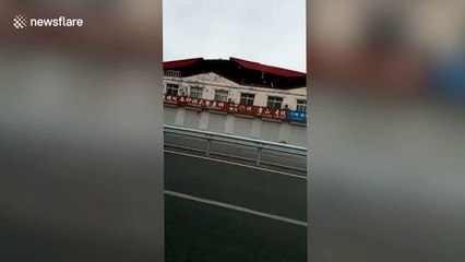 Man freaks out when powerful wind rips roof off building