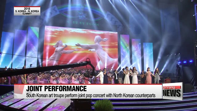 Two Korea's end joint pop concert with standing ovation