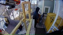 Surveillance Video Shows Man Chasing Off Would-Be Burglars