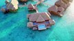 Flying over the St Regis Resort luxury overwater bungalow in Bora Bora