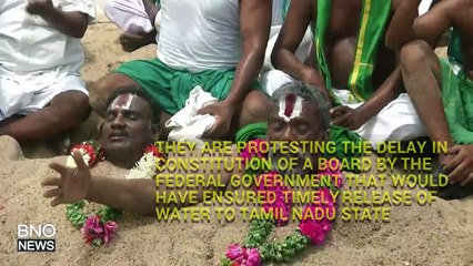 Indian Farmers Bury Themselves in Sand Over River Water Dispute