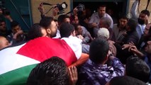 Gazze sınırındaki gösterilerde şehit olan Filistinli Üsame Kadih'in cenaze töreni - HAN YUNUS