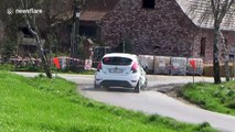 Rally car smashes hard into barrier during race in Belgium