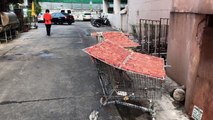 Thai Restaurant Uses Shopping Trolleys To Dry Meat