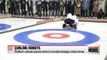 AI robots face human opponents in curling match