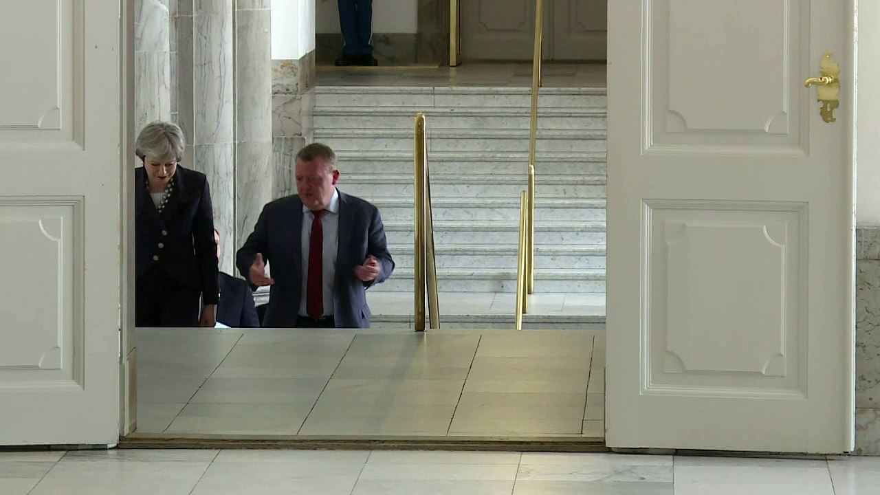 Theresa May visits Copenhagen for talks with Da...