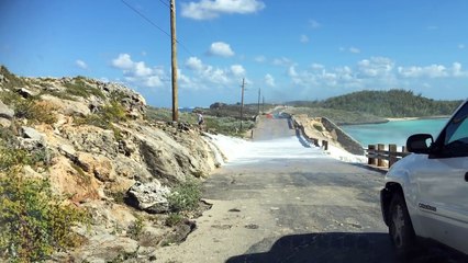 tourist is swept away by a wave
