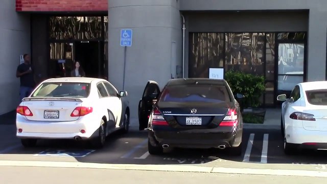 Kourtney Kardashian Slides Into Leather Pants Before Hitting The Studio [2013]