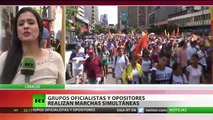 Chavismo y oposición calientan las calles de Caracas con dos marchas