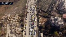 Un dron graba cómo los sirios abandonan Alepo hacia los distritos liberados