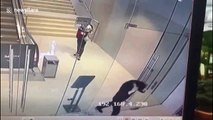 Dopey shopper shatters glass door by running into it