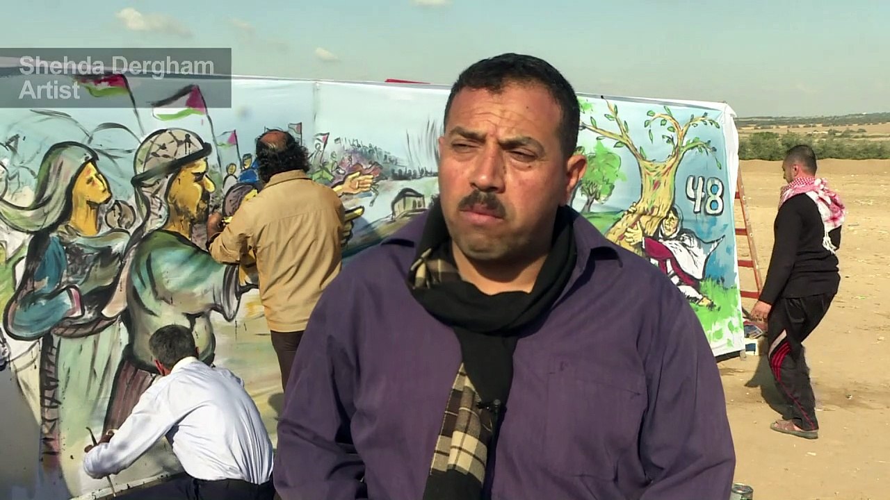 Palestinian artists decorate tents with paintin...