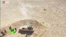 Filmado por un dron: Terroristas del Estado Islámico huyen atemorizados ante el Ejército sirio