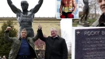Sylvester Stallone raises fists under Rocky statue in Philadelphia as he poses for Creed II photo op.
