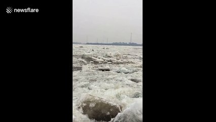 China northern river starts to melt in spring awakening