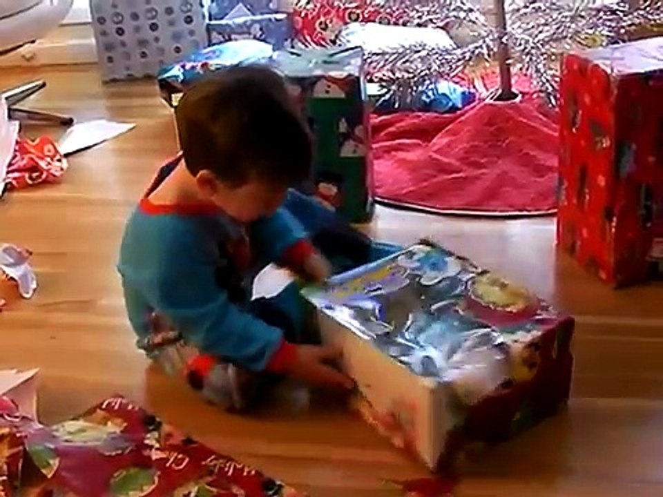 Grayson Danger opens presents Christmas new