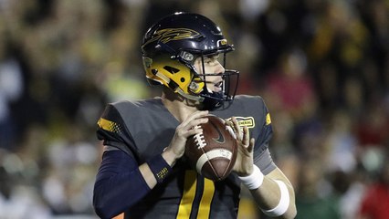 Breaking down Logan Woodside's college highlights