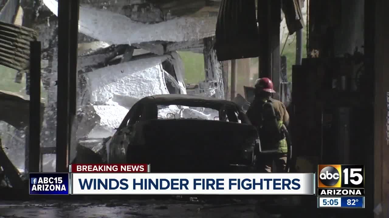 Winds hinder firefighters battling building fire in Phoenix