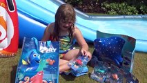 Finding Dory Movie Surprise Toys + Giant inflatable Water Slide | The Disney Toy Collector