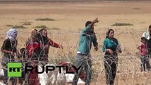 Enfrentamiento entre refugiados sirios y guardafronteras turcos