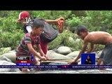 Siswa Seberangi Sungai Pakai Ban Bekas Untuk Ke Sekolah NET12