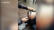 Chinese barber uses sickle to cut hair in China