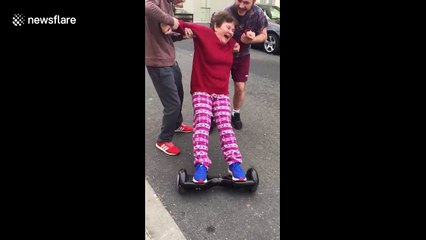 Woman takes on hoverboard and fails terribly