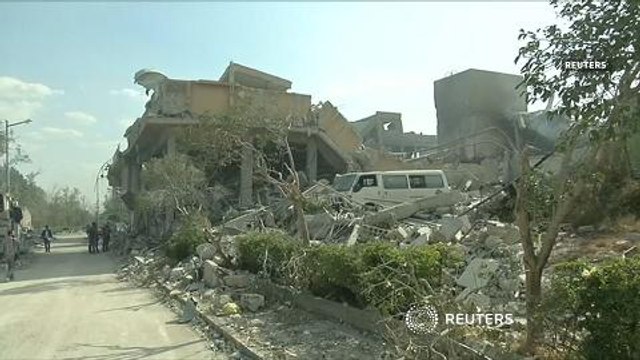 British PM defends air strikes in Syria against parliament critics