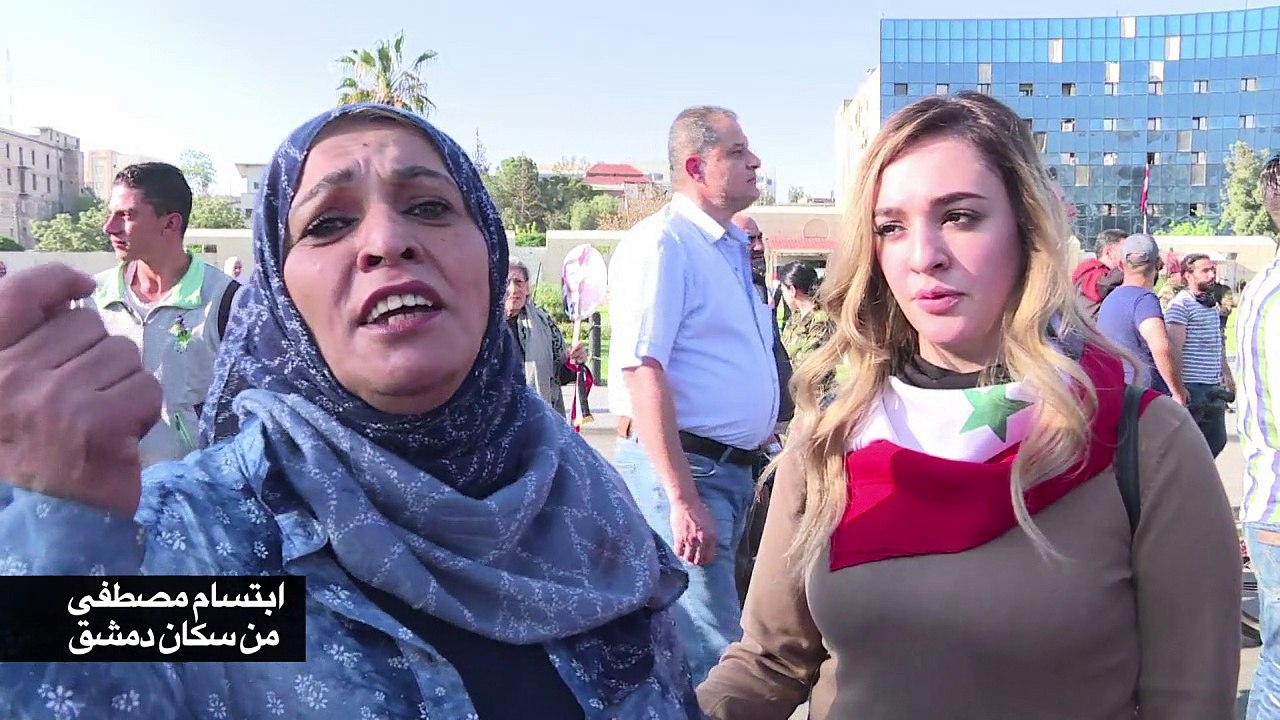 سوريون في دمشق يعربون عن تضامنهم مع الأسد إثر الضربات على أهداف للنظام