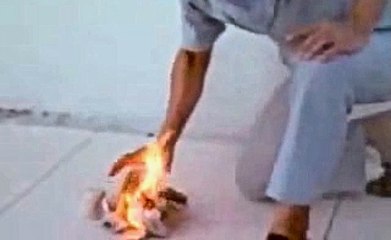 Chi Kung Master Burns Paper With His Hand - John Chang