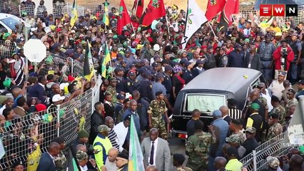 Winnie’s body returns to her home in Soweto draped in ANC flag
