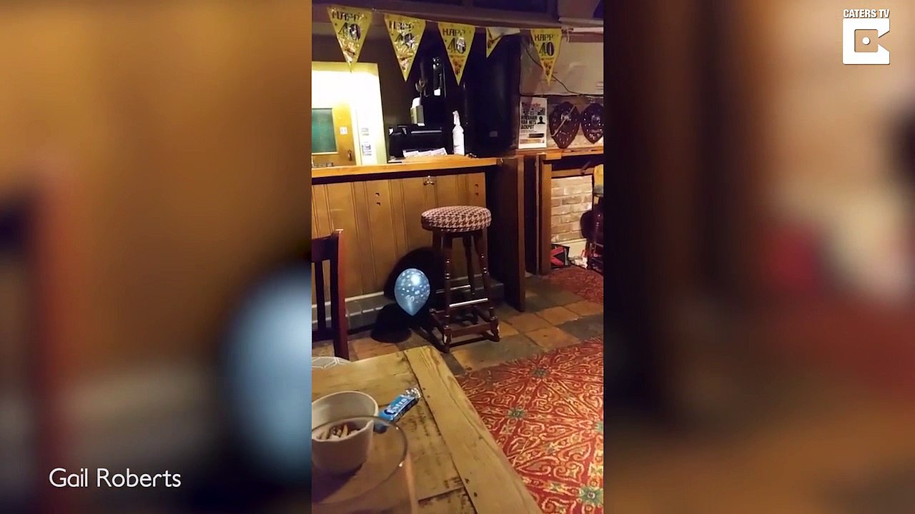 Child plays with ghost balloon