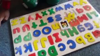 Aziah Plays With ABC Puzzle