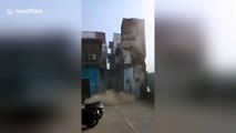 Terrifying moment abandoned building collapses