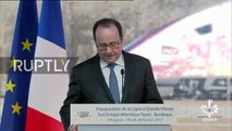 Hollande'ın konuşması sırasında, keskin nişancı polisin silahının ateş aldığı anlar