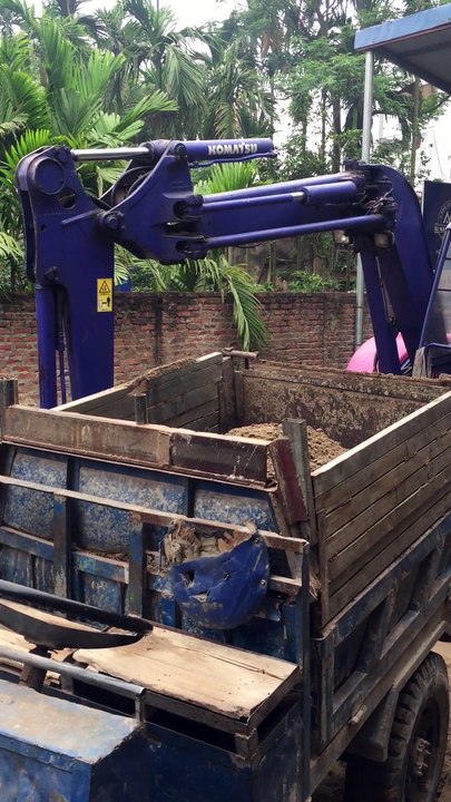 Kid Driving an Excavator