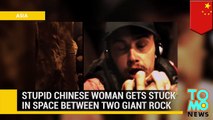 El gran busto y trasero de una mujer china la dejo atrapada entre dos rocas gigantes