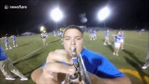 Hilarious marching band fail as high-school student trips up