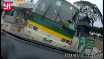 Out-of-control bus smashes through toll booth into car