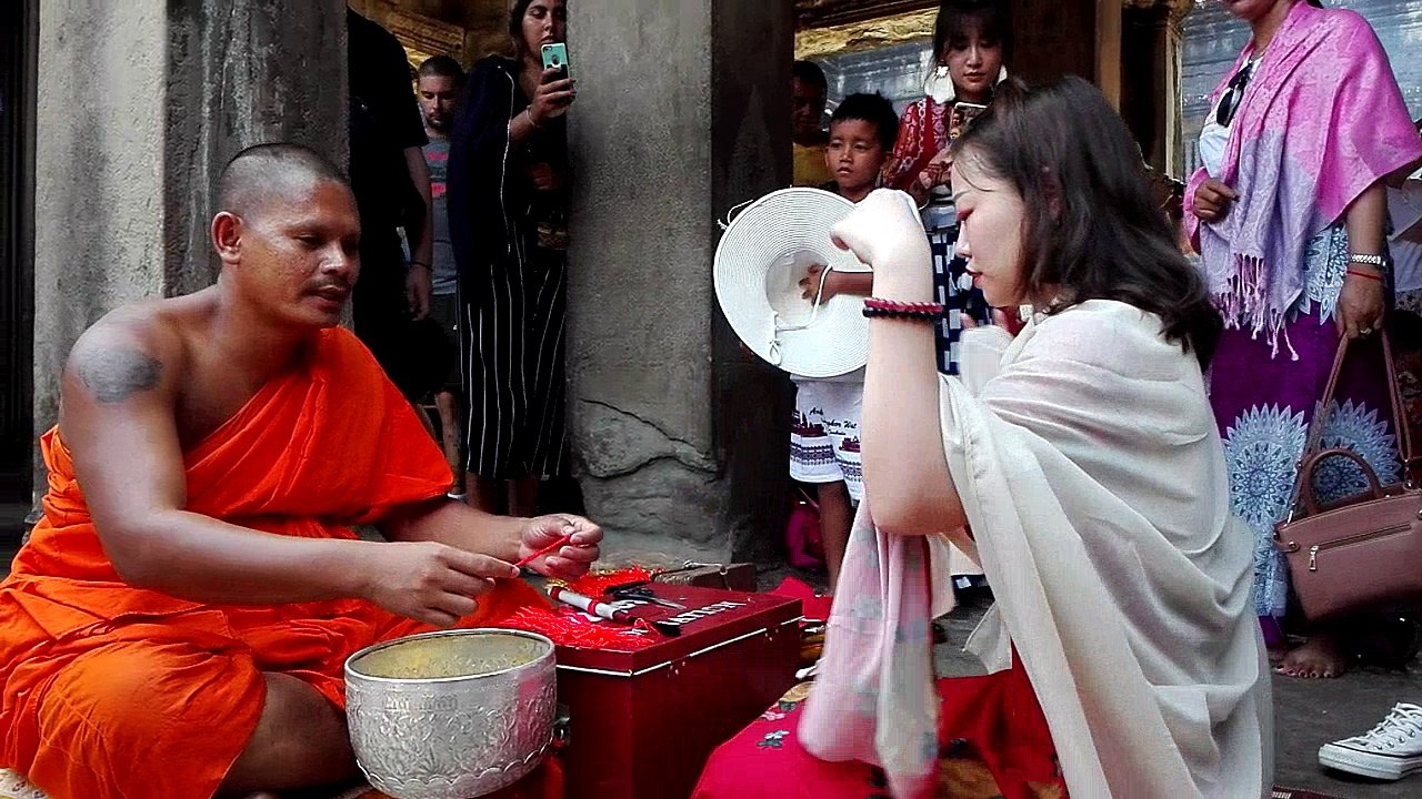 very cute Chinese girl needs sacred water from my monk