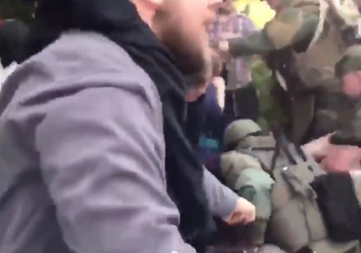 Police Scuffle with Anti-Fascist Protesters at Neo-Nazi Rally in Georgia