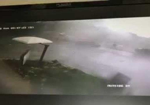 Tornado Blows Debris Through Sonic Drive-Thru in Galliano, Louisiana