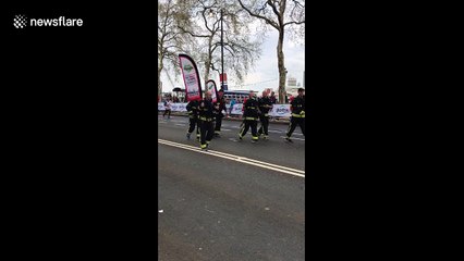 Grenfell firefighters run London Marathon in full kit