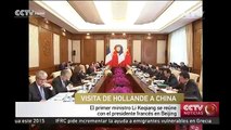 El primer ministro Li Keqiang se reune con el presidente francés Hollande en Beijing