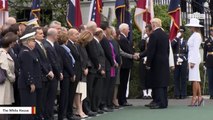 Melania Trump Wears Eye-Catching White Hat For Macron's Arrival Ceremony